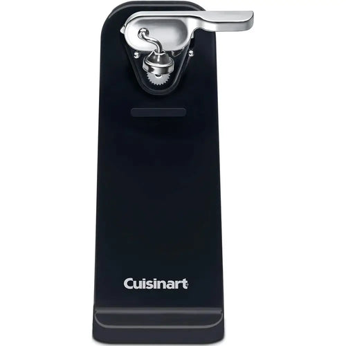 Automatic electric can opener opening a metal can on a modern kitchen countertop