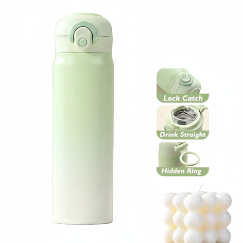 Sleek gradient-colored 500ml vacuum insulated thermos mug standing on a wooden desk next to coffee beans